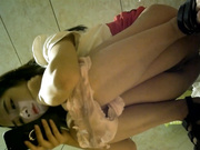 KTV夜场厕所偷拍.极品长腿女神,包臀齐B裙,看着手机傻笑